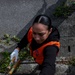 Marines volunteer in vine removal event to aide Okinawa City residents