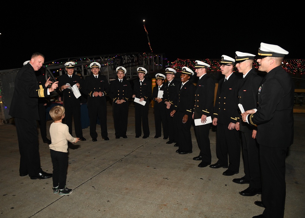 Commander of U.S. 4th Fleet Sings Along with Local Community at Holiday Lights Event