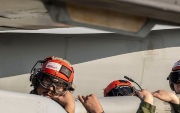 U.S. Marines perform ordnance loading and refueling