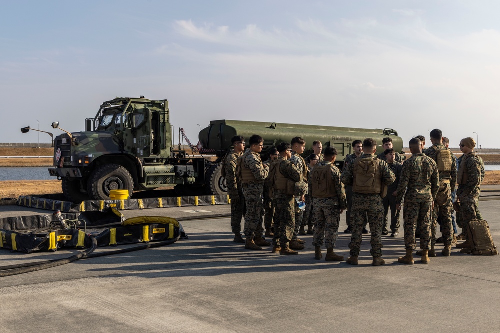 U.S. Marines perform ordnance loading and refueling