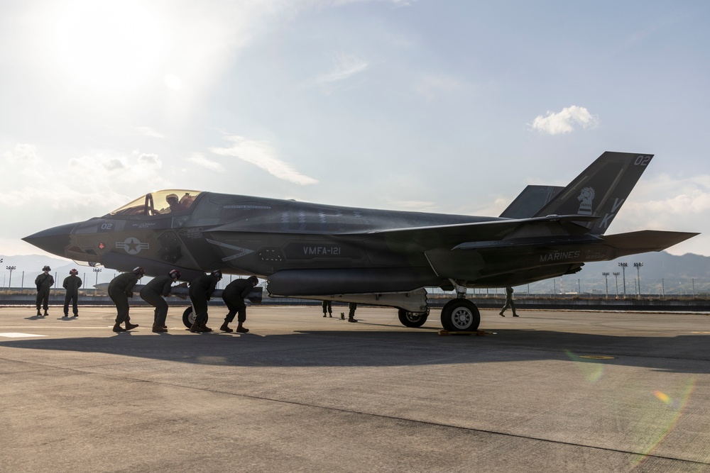 U.S. Marines perform ordnance loading and refueling