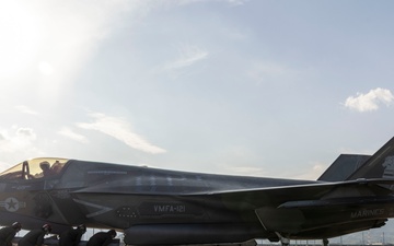 U.S. Marines perform ordnance loading and refueling