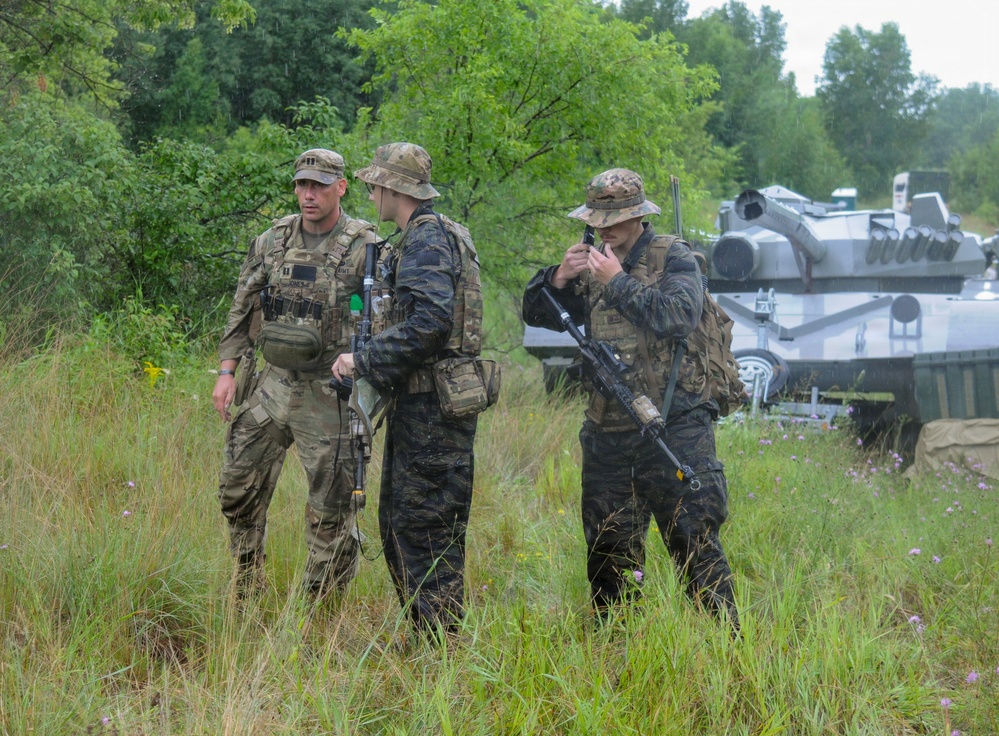 1-145th Armored Regiment cavalry scouts conduct reconnaissance during modernization training