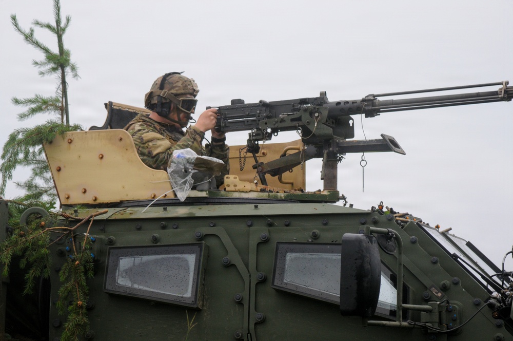1-145th Armored Regiment cavalry scouts conduct reconnaissance during modernization training