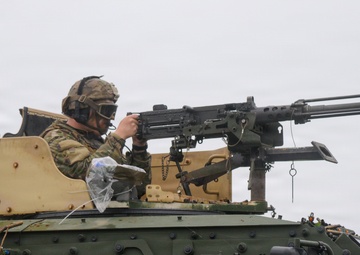 1-145th Armored Regiment cavalry scouts conduct reconnaissance during modernization training