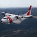 U.S. Coast Guard aircraft soar over Mount Rushmore