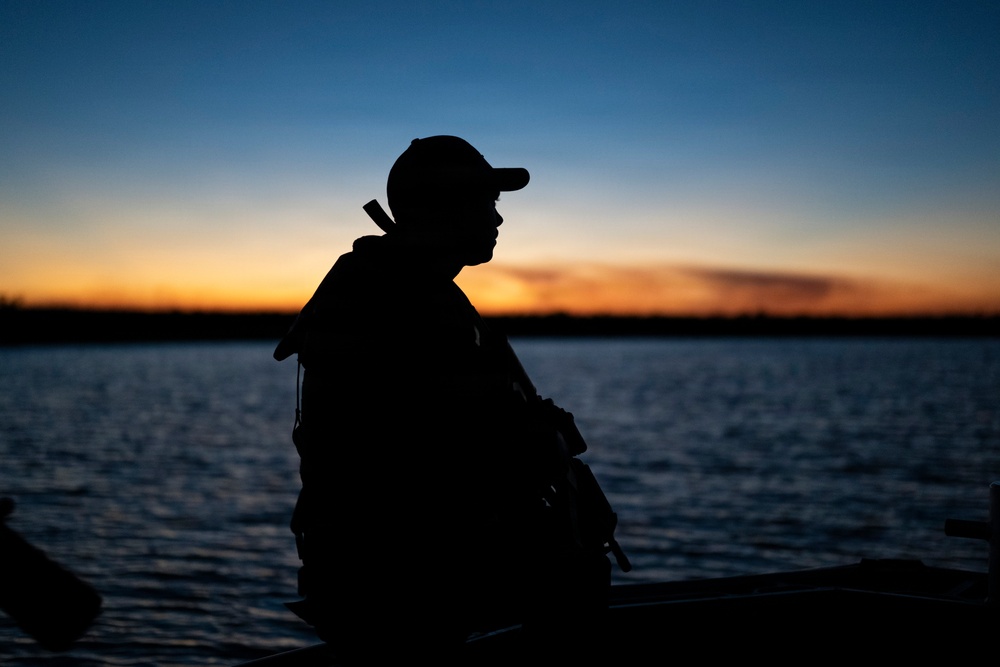 Coast Guard members patrol Rio Grande near Starbase, Texas