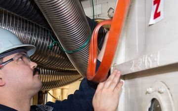 Headline: Ronald Reagan Sailors and Contractors Install Gasket and Berthing Furniture