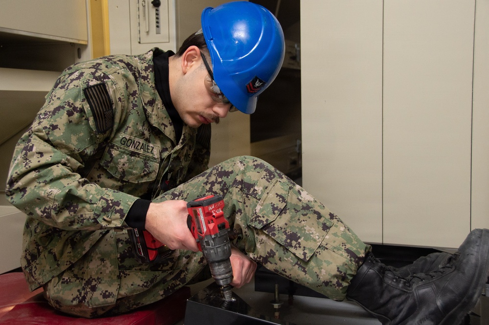 Ronald Reagan Sailors and Contractors Install Gasket and Berthing Furniture