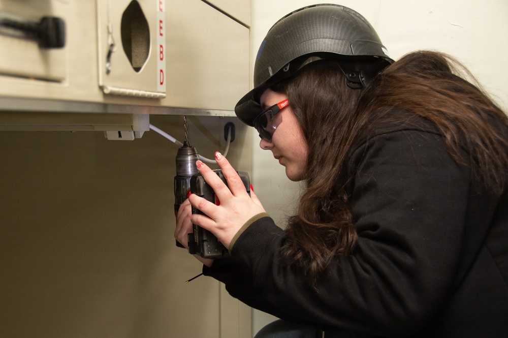 Ronald Reagan Sailors and Contractors Install Gasket and Berthing Furniture