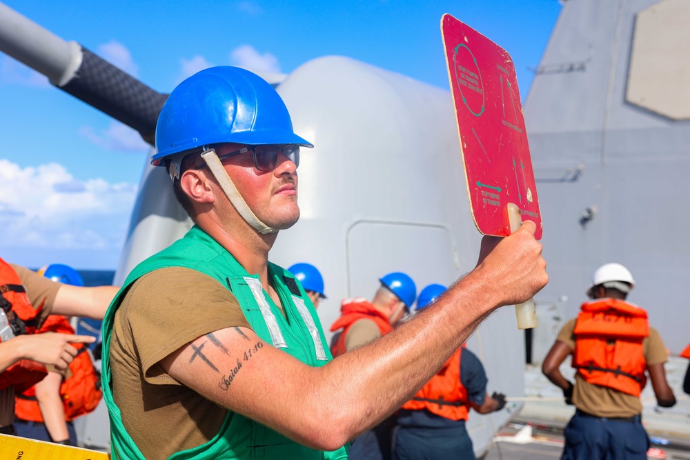 USS Lake Erie (CG 70) conducts a replenishment-at-sea with USNS Supply (T-AOE-6)