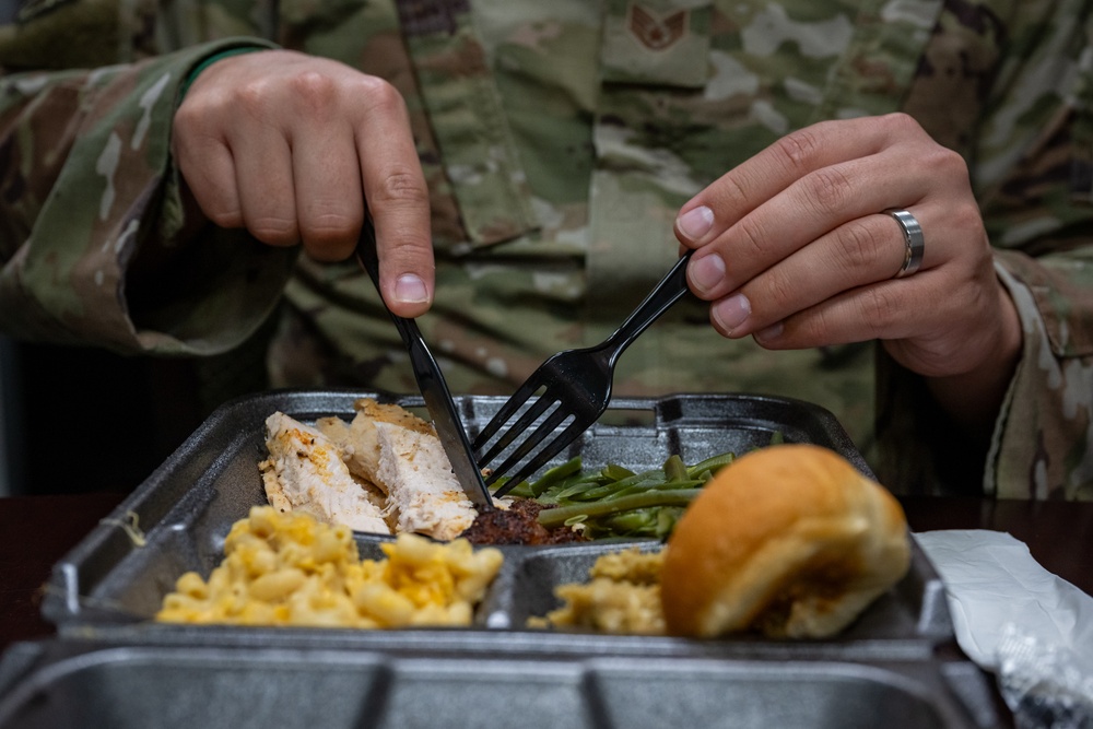 Members of 125th Fighter Wing Leadership Serve Holiday Meals to Airmen