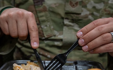 Members of 125th Fighter Wing Leadership Serve Holiday Meals to Airmen
