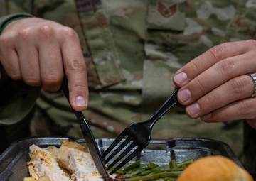 Members of 125th Fighter Wing Leadership Serve Holiday Meals to Airmen