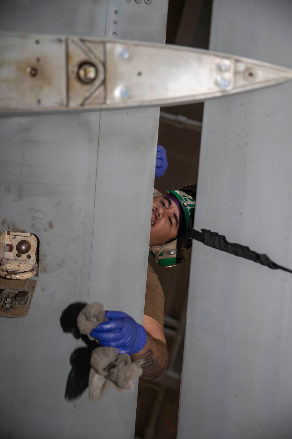 Abraham Lincoln conducts routine aircraft maintenance