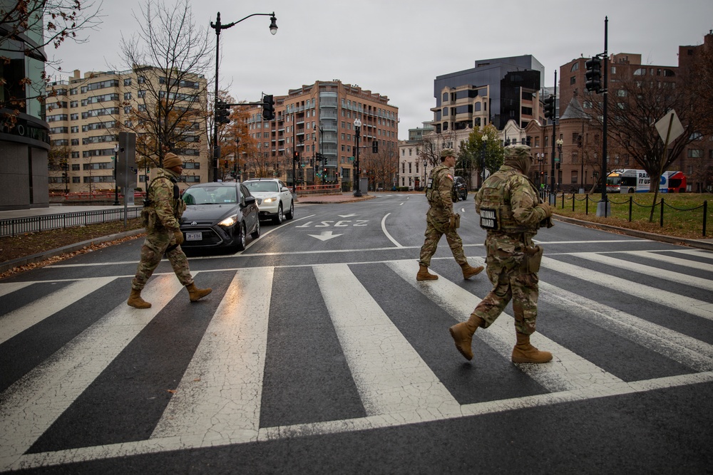 Mississippi Army National Guard Soldiers cross the street in Washington, D.C.