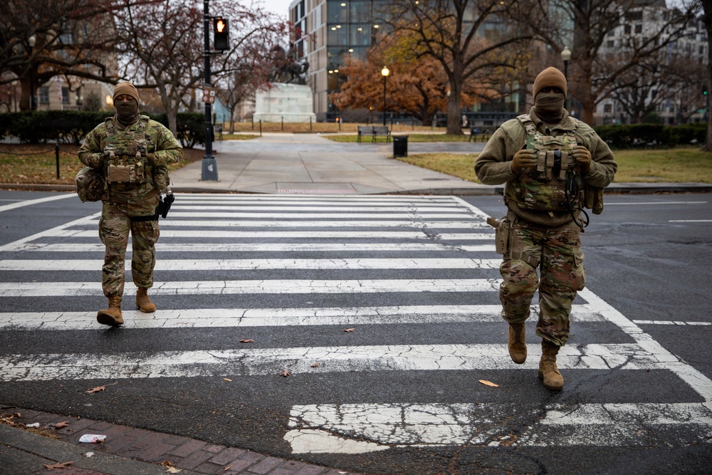 Mississippi Army National Guard Soldiers cross the street in Washington, D.C.