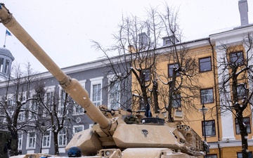 U.S. Soldiers display a tank at the remembrance ceremony in Narva