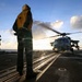 U.S. Sailors Prepare to Chock and Chain an MH-60R Seahawk Helicopter