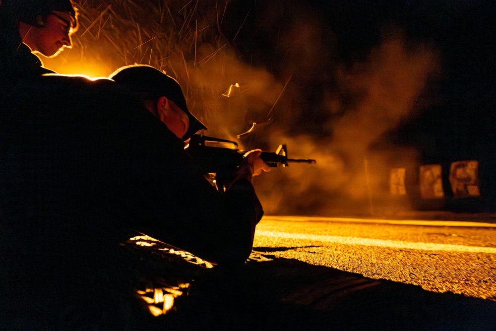 U.S. Sailor Fires an M4 Carbine During a Low-Light Live-Fire Exercise on the Flight Deck