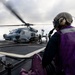 U.S. Sailors Refuel an MH-60R Sea Hawk Helicopter