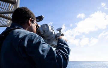 A U.S. Sailor Stands Lookout on the Bridge Wing