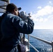 A U.S. Sailor Stands Lookout on the Bridge Wing