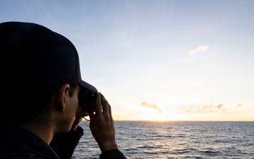 U.S. Sailor Stands Lookout on the Bridge