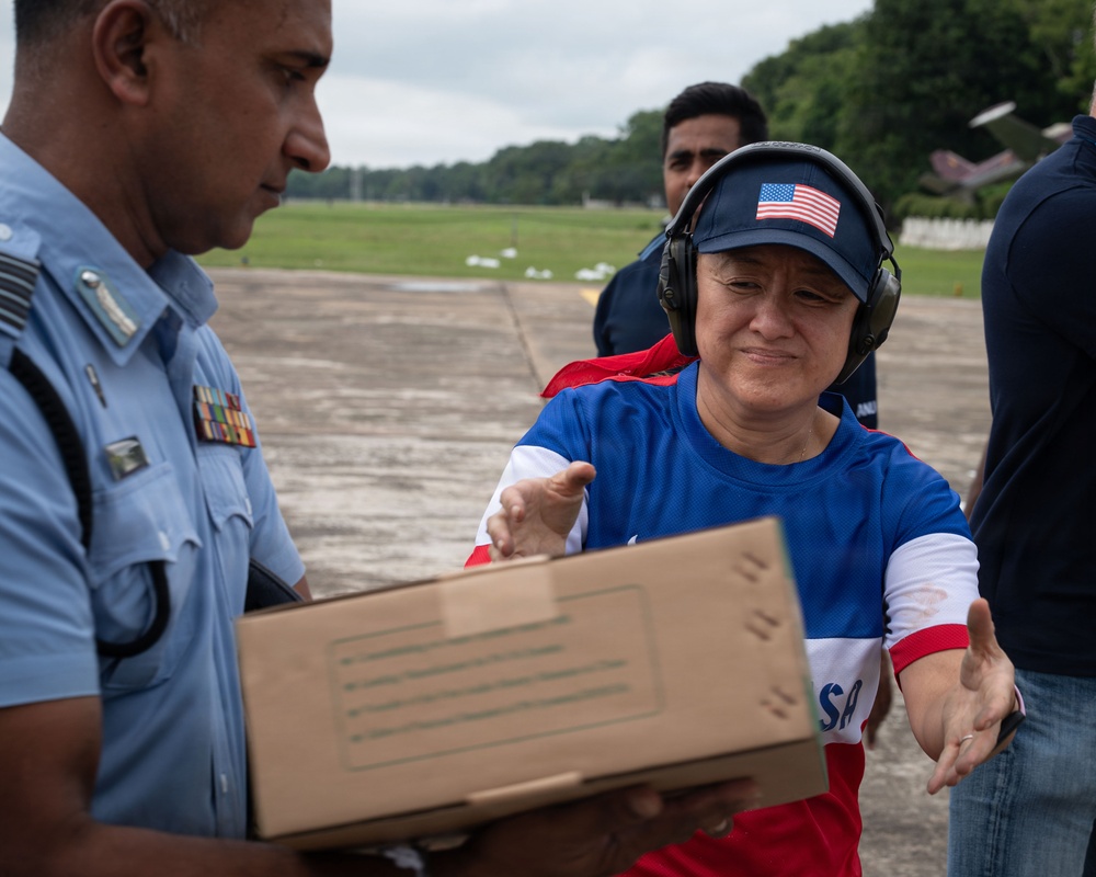 U.S. Ambassador to Sri Lanka, service members transport humanitarian aid to Anuradhapura, Trichomalee