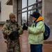 A Mississippi Army National Guard Soldier talks to a member of the public in Washington, D.C.