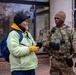 A Mississippi Army National Guard Soldier talks to a member of the public in Washington, D.C.