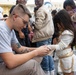 Marines, Sailors from 1st MAW distribute toys