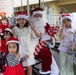 Marines, Sailors from 1st MAW distribute toys
