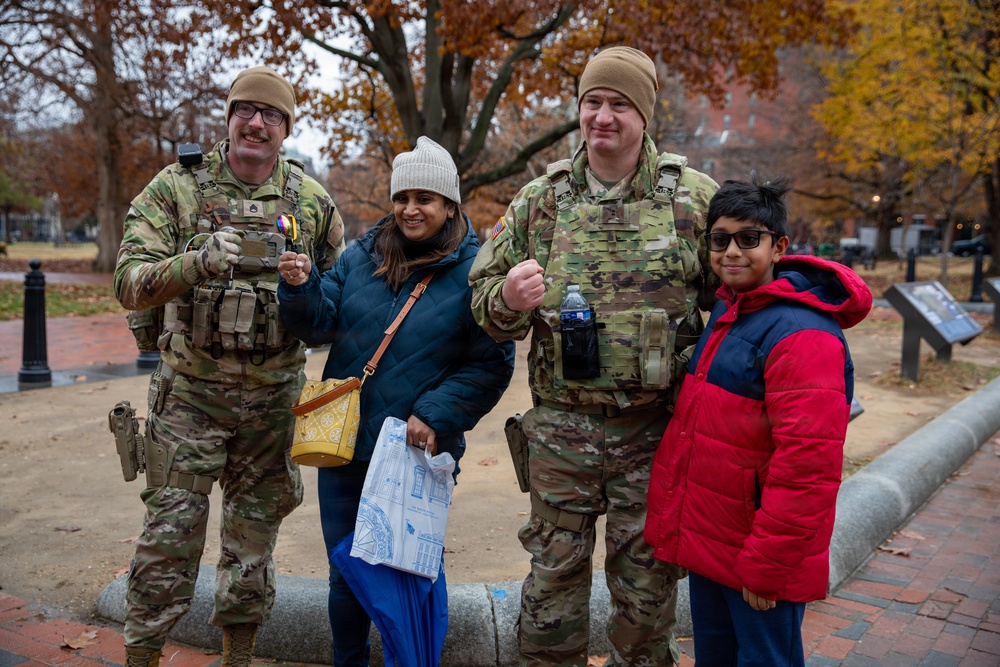 Mississippi Army National Guard Soldiers take a picture with members of the public in Washington, D.C.