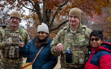 Mississippi Army National Guard Soldiers take a picture with members of the public in Washington, D.C.