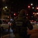 A Mississippi Army National Guard Soldier on patrol at night in Washington, D.C.