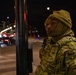 A Mississippi Army National Guard Soldier on patrol at night in Washington, D.C.