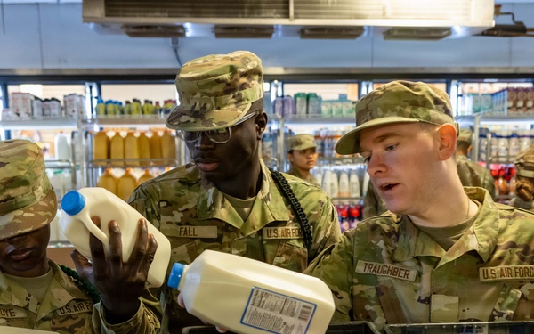 USAFSAM students learn food safety through hands-on inspections, community tours