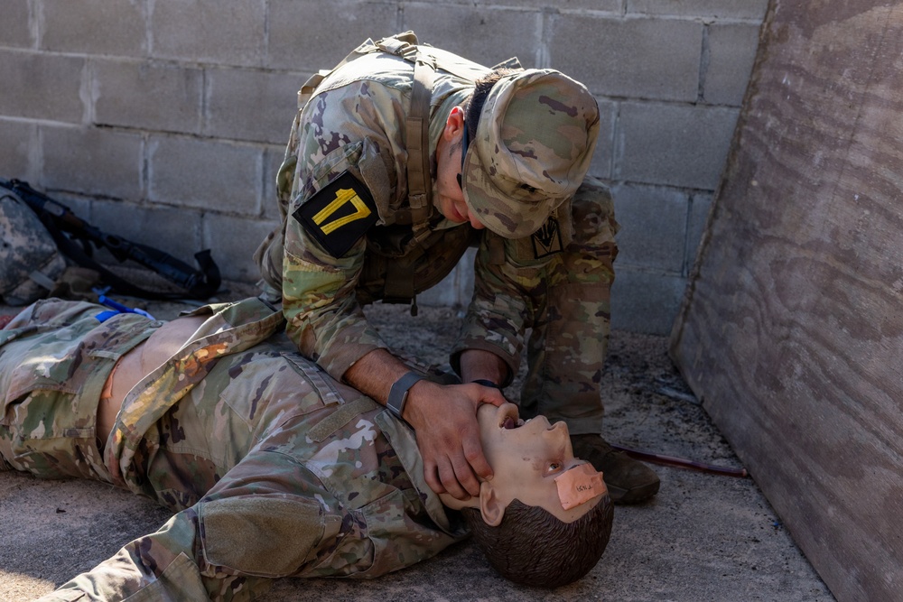 OC/T Checks Breathing on Simulated Casualty
