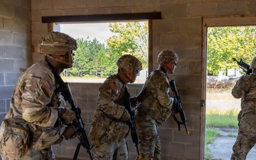 Squad Conducts Battle Drill while Observered by OC/Ts