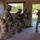 Squad Conducts Battle Drill while Observered by OC/Ts