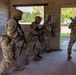 Squad Conducts Battle Drill while Observered by OC/Ts