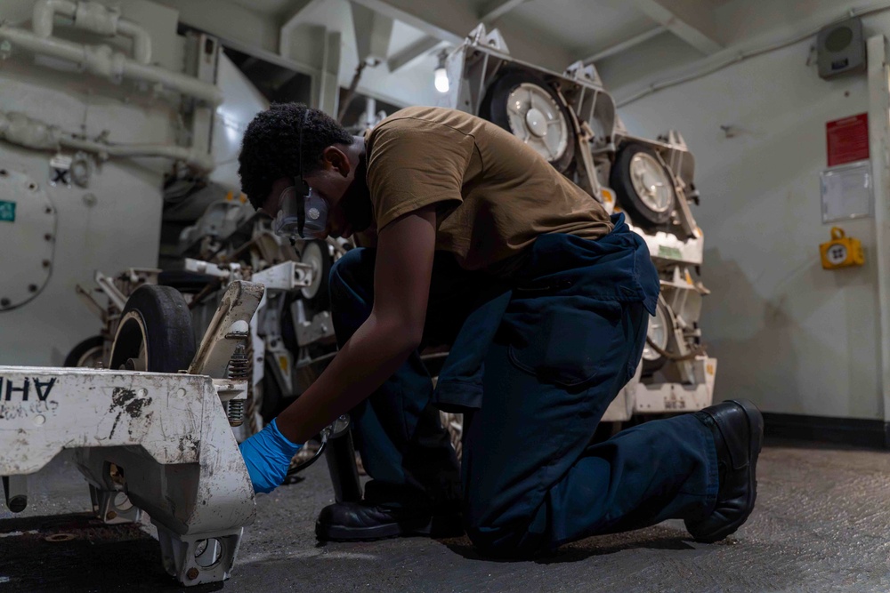 Abraham Lincoln conducts routine maintenance