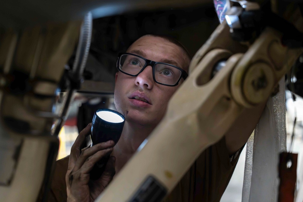 Abraham Lincoln conducts routine aircraft maintenance