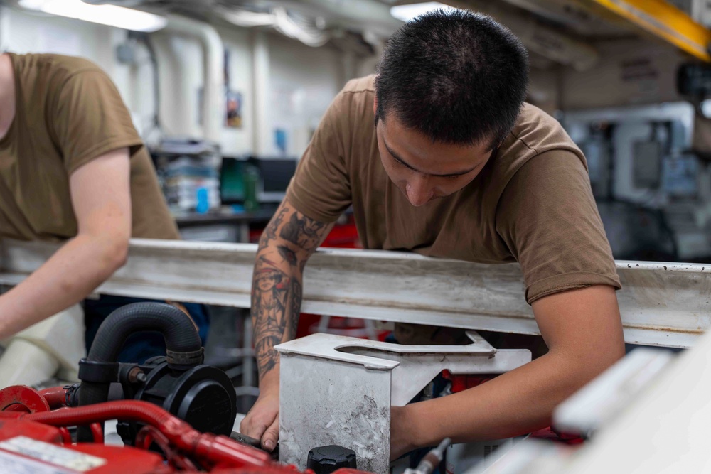 Abraham Lincoln conducts routine maintenance