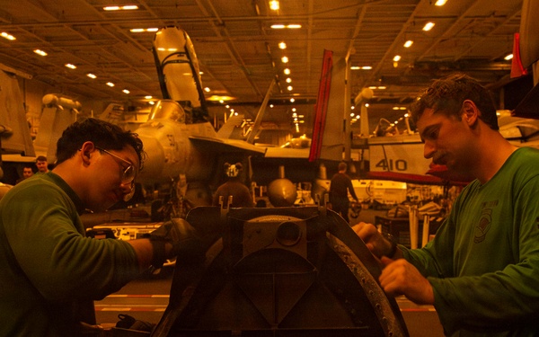 Abraham Lincoln conducts routine aircraft maintenance