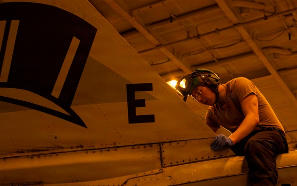 Abraham Lincoln conducts routine aircraft maintenance