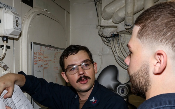 Frank E. Petersen Jr. conducts routine operations