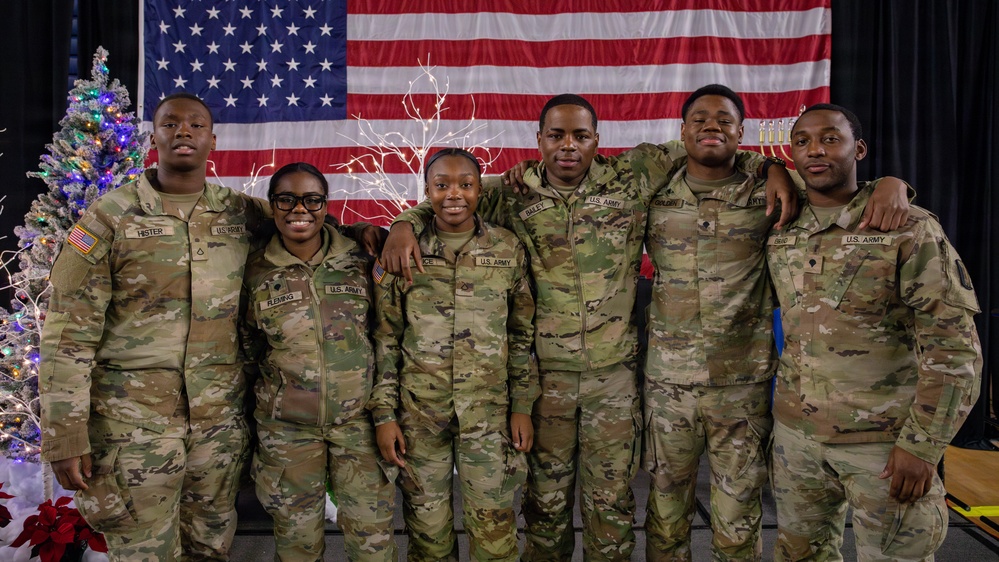 Mississippi National Guard Soldiers take a picture together during a holiday luncheon
