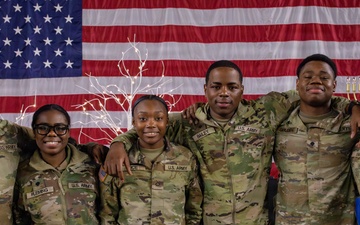 Mississippi National Guard Soldiers take a picture together during a holiday luncheon